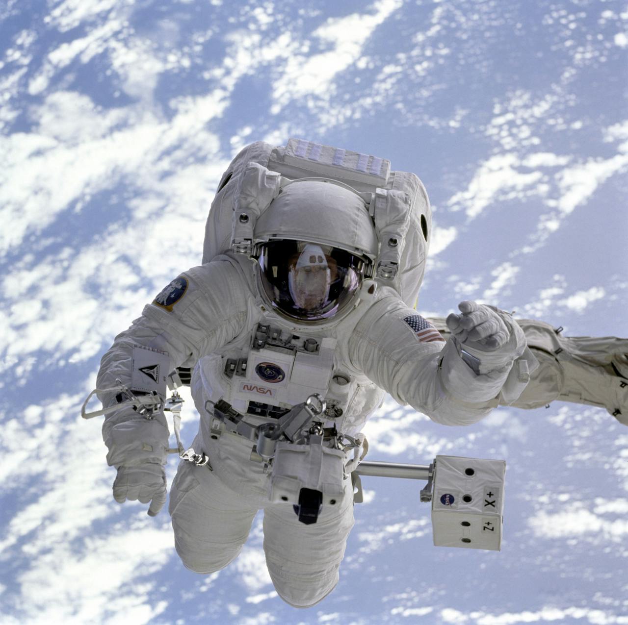 An astronaut in space suit
AI-generated content may be incorrect.