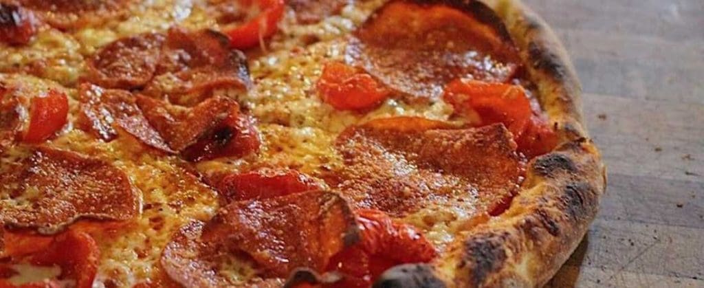 A close up of a pizza
Description automatically generated